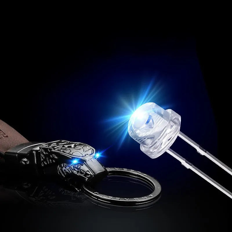 Creative LED Light Leopard Head Model Keychain Real Cowhide Key Holder